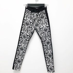 BDG black floral print jeans. High rise twig ankle